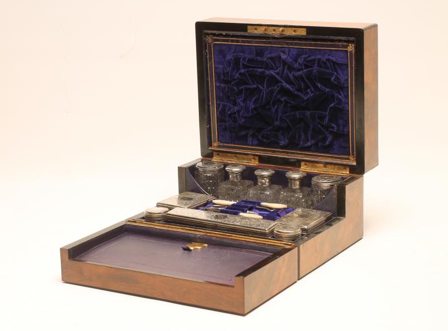 A VICTORIAN WALNUT TRAVELLING DRESSING CASE Image