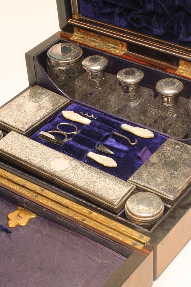 A VICTORIAN WALNUT TRAVELLING DRESSING CASE Image