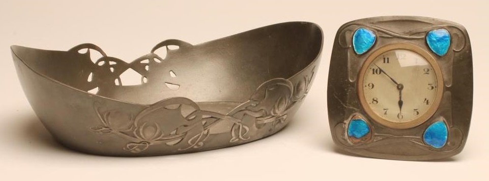 A TUDRIC PEWTER AND ENAMEL DESK CLOCK Image