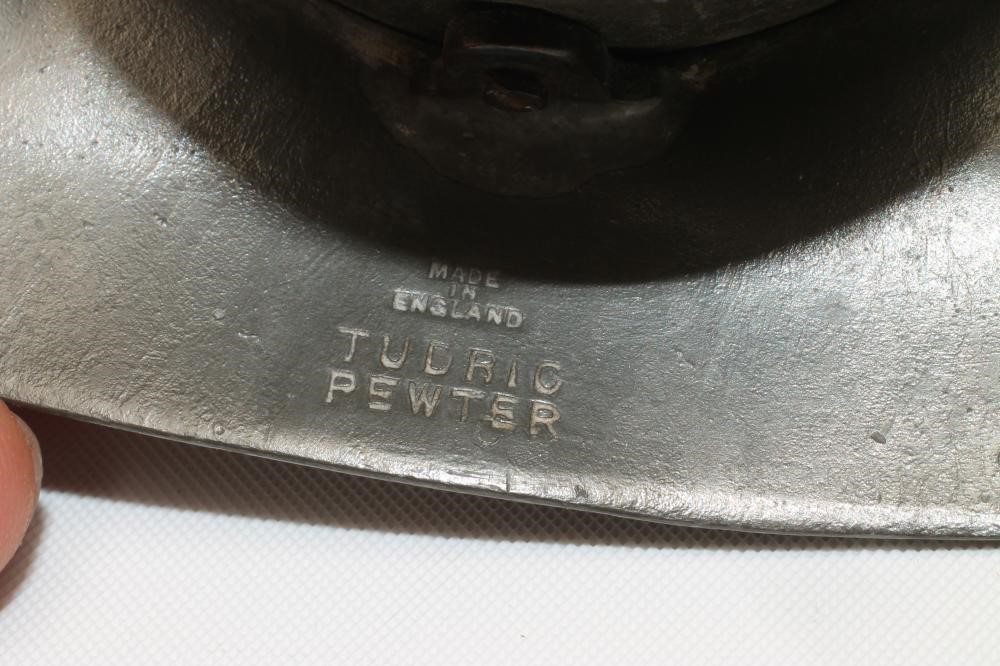 A TUDRIC PEWTER AND ENAMEL DESK CLOCK Image