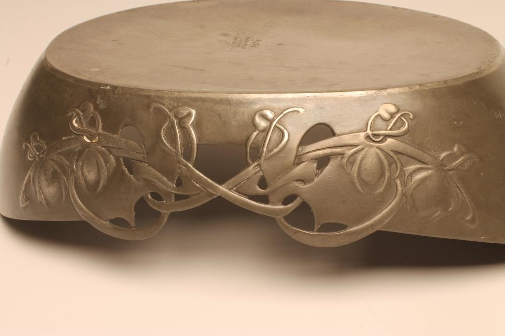 A TUDRIC PEWTER AND ENAMEL DESK CLOCK Image