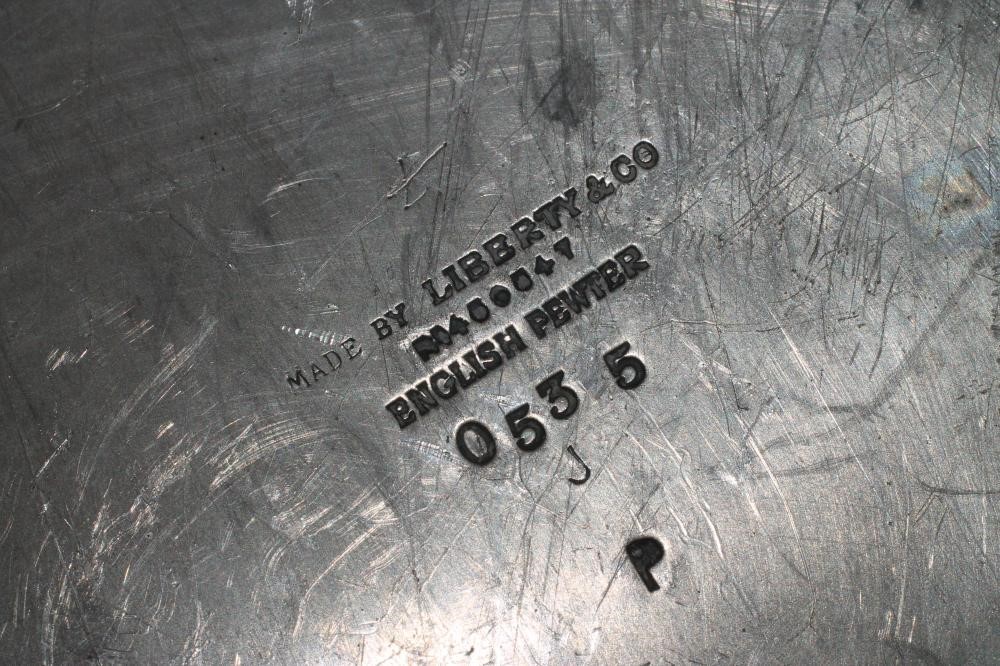 A TUDRIC PEWTER AND ENAMEL DESK CLOCK Image