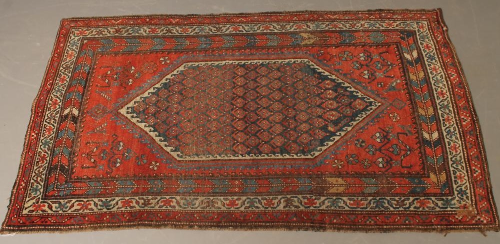 A WEST PERSIAN TRIBAL RUG Image