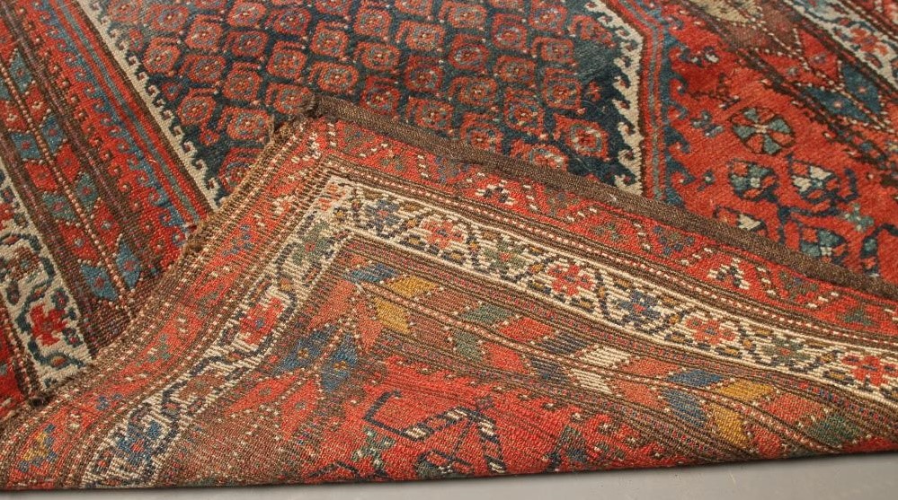 A WEST PERSIAN TRIBAL RUG Image
