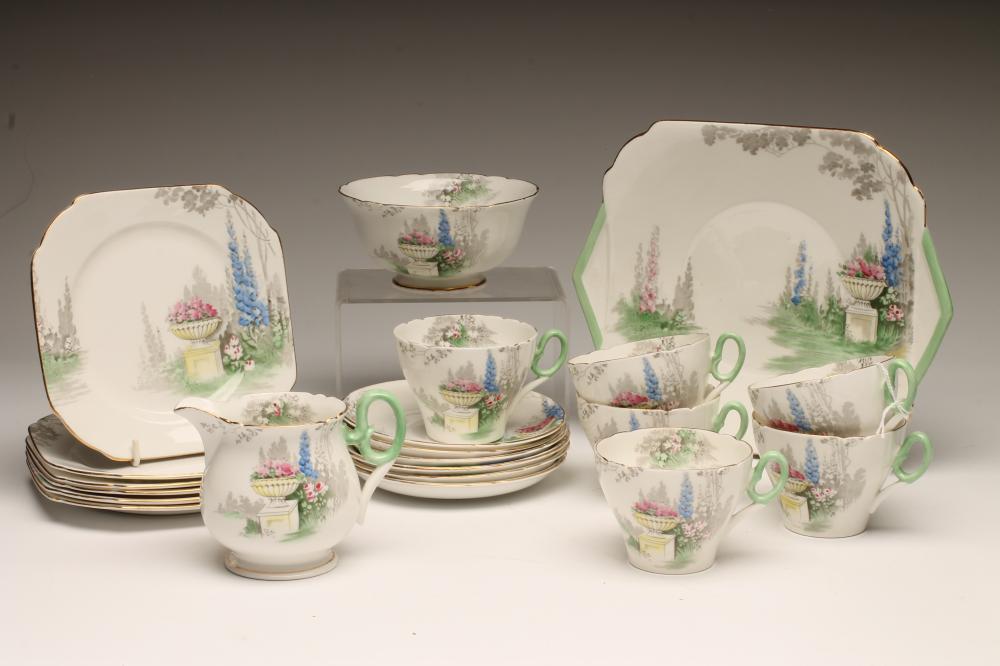 AN ART DECO SHELLEY CHINA TEA SERVICE printed in grey and overpainted in pink Image