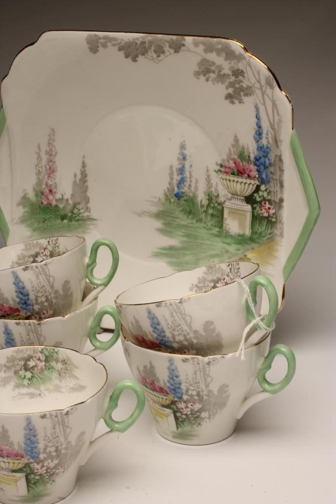 AN ART DECO SHELLEY CHINA TEA SERVICE printed in grey and overpainted in pink Image