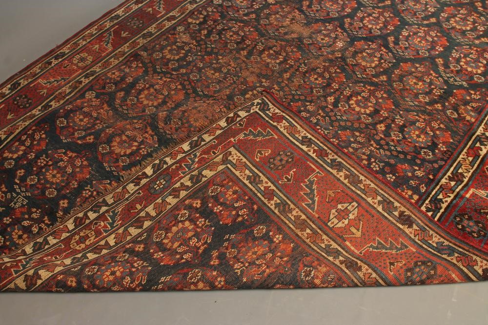 A PERSIAN TRIBAL RUG Image