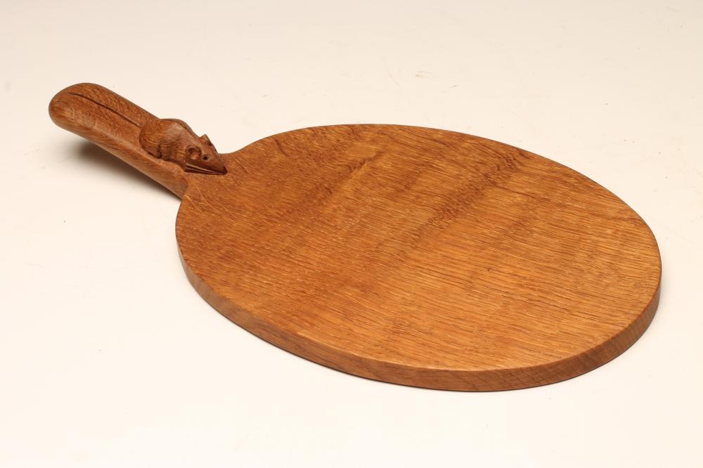 A ROBERT THOMPSON OAK CHEESE BOARD Image