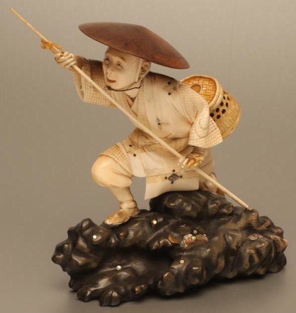 A JAPANESE IVORY OKIMONO Image