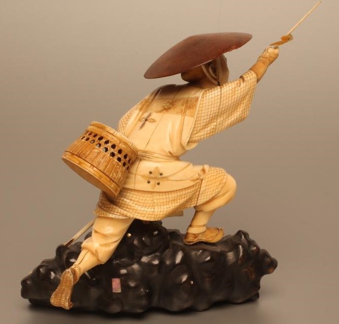 A JAPANESE IVORY OKIMONO Image