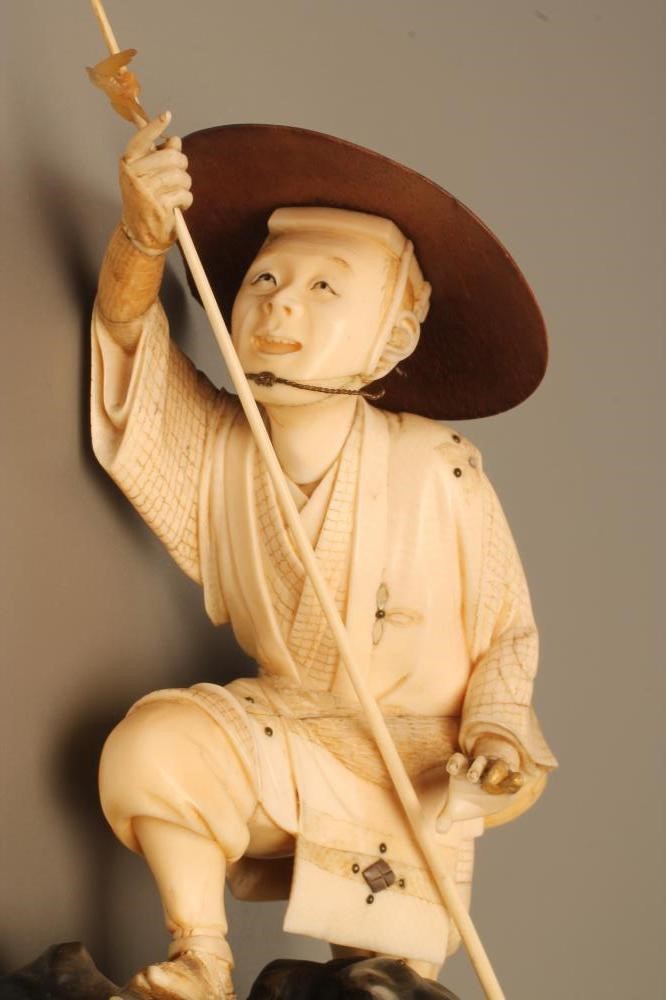 A JAPANESE IVORY OKIMONO Image