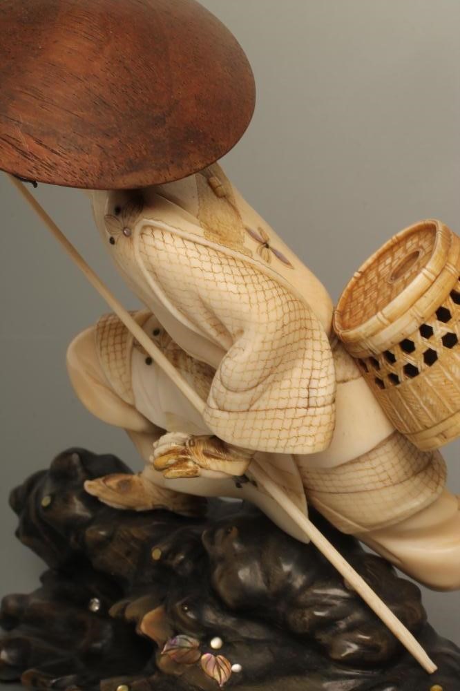 A JAPANESE IVORY OKIMONO Image