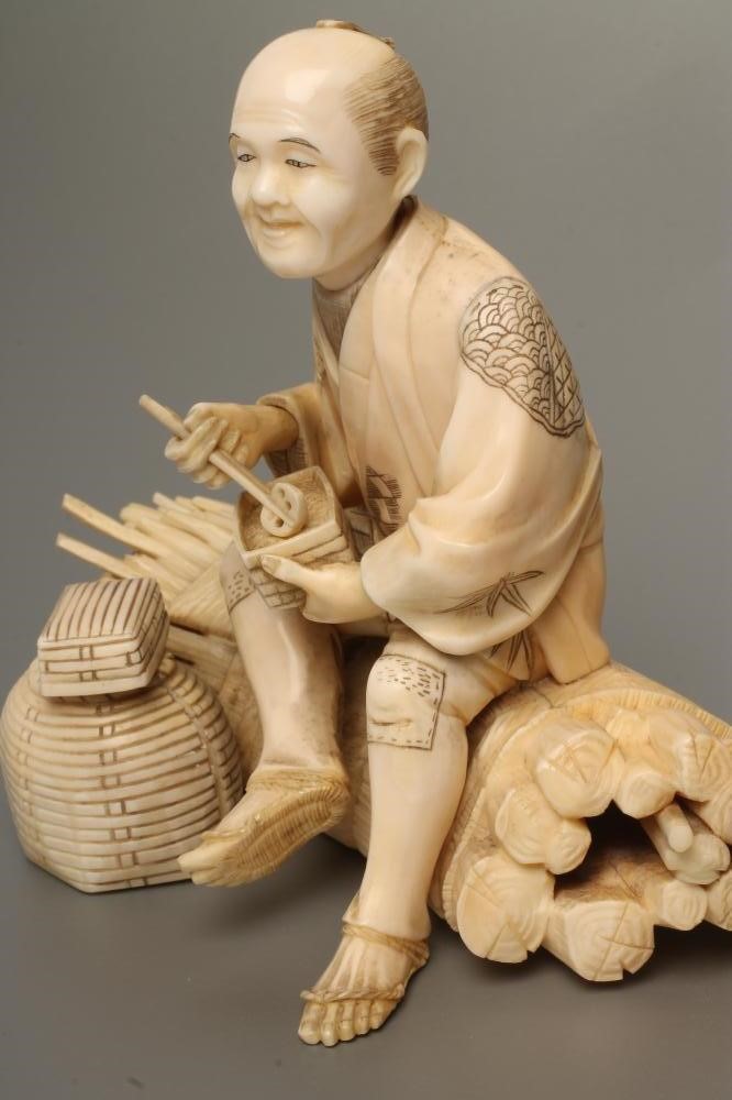 A JAPANESE IVORY OKIMONO Image
