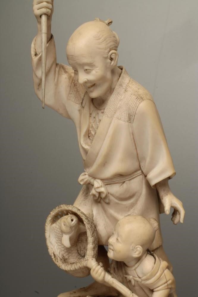 A JAPANESE IVORY OKIMONO Image
