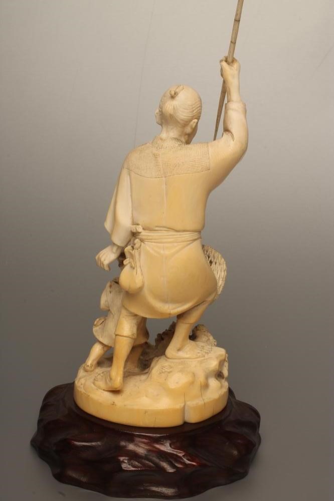 A JAPANESE IVORY OKIMONO Image