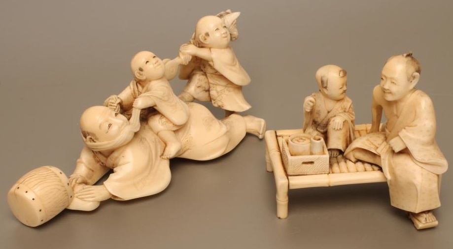 TWO JAPANESE SMALL IVORY CARVED FIGURE GROUPS Image