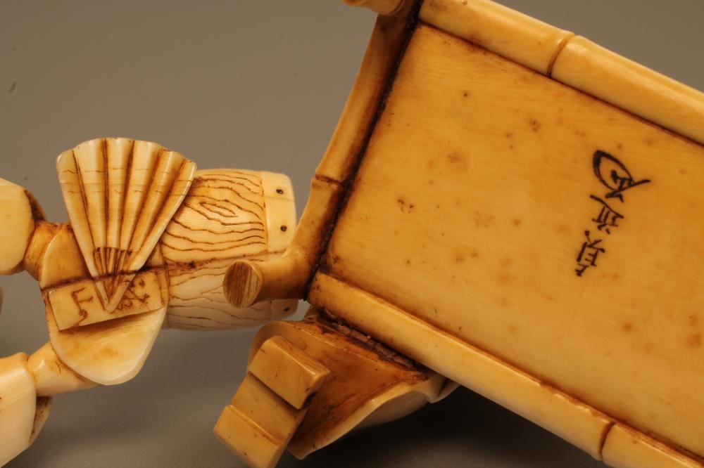 TWO JAPANESE SMALL IVORY CARVED FIGURE GROUPS Image