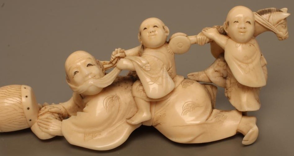 TWO JAPANESE SMALL IVORY CARVED FIGURE GROUPS Image