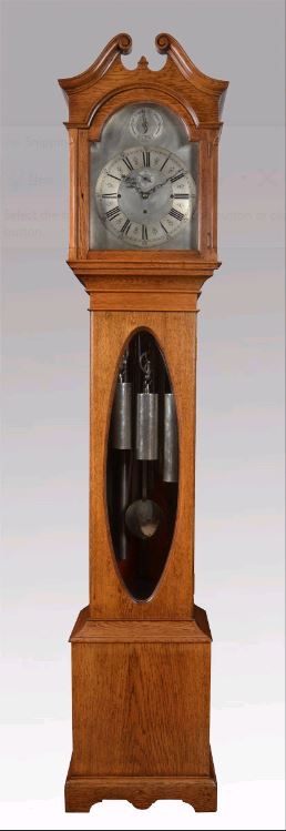 AN OAK CHIMING LONGCASE Image