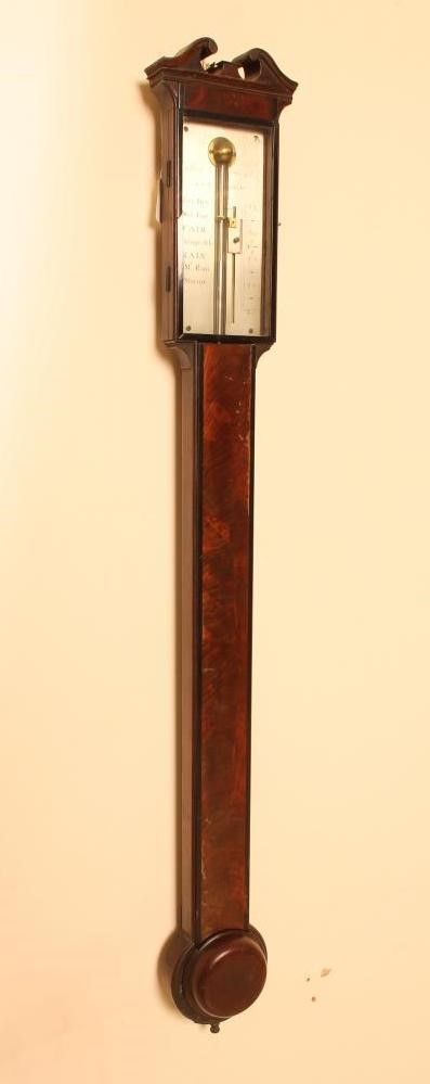 A MAHOGANY CASED STICK BAROMETER by Gilbert & Wright Image