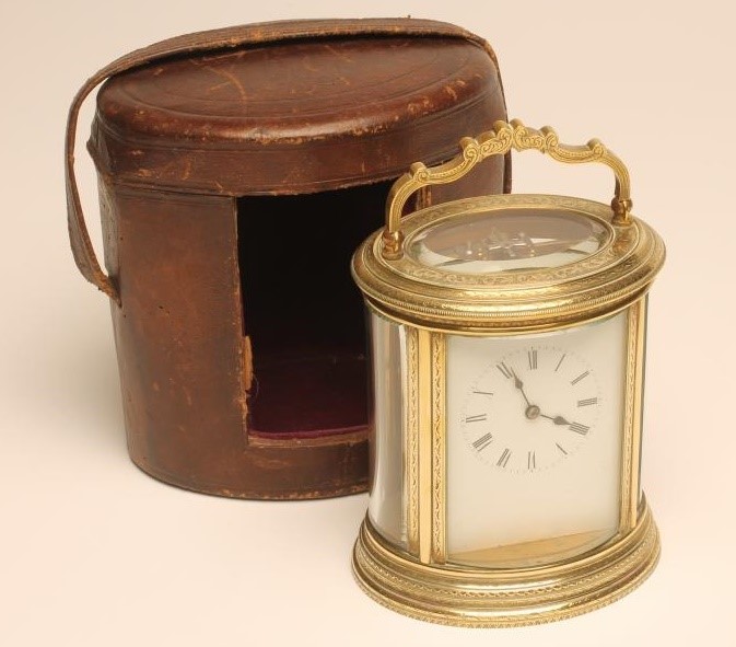 A BRASS CASED CARRIAGE CLOCK Image