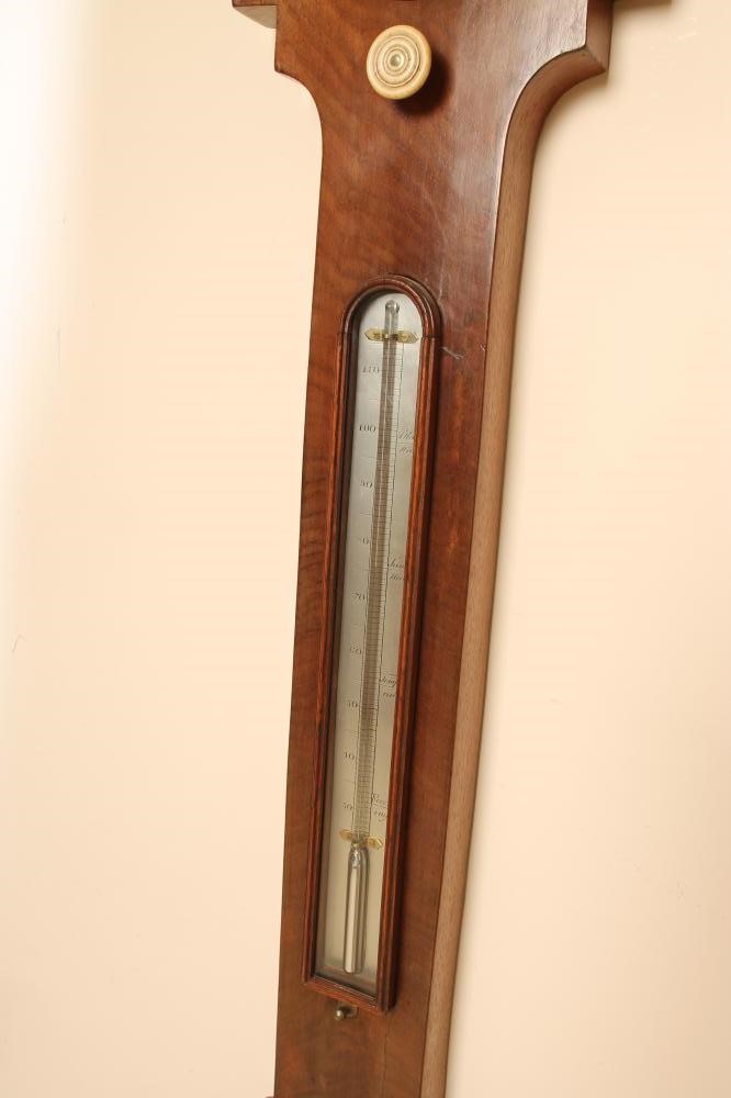 A MAHOGANY CASED UPSIDE DOWN WHEEL BAROMETER by Intross of Rochester Bridge Image