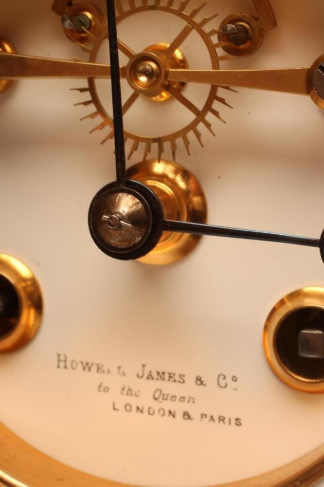A BRASS CASED FOUR GLASS MANTEL CLOCK Image