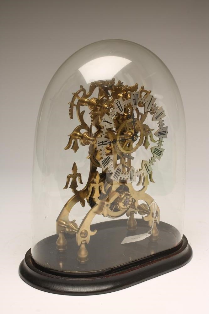 A BRASS SKELETON MANTEL TIMEPIECE Image