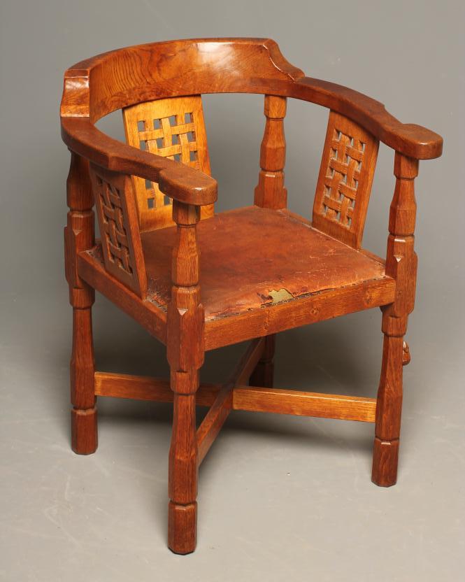 A ROBERT THOMPSON "MONKS" OAK ARMCHAIR Image