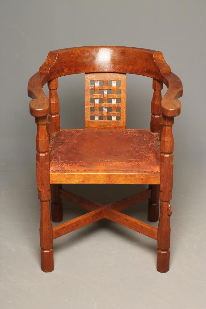 A ROBERT THOMPSON "MONKS" OAK ARMCHAIR Image