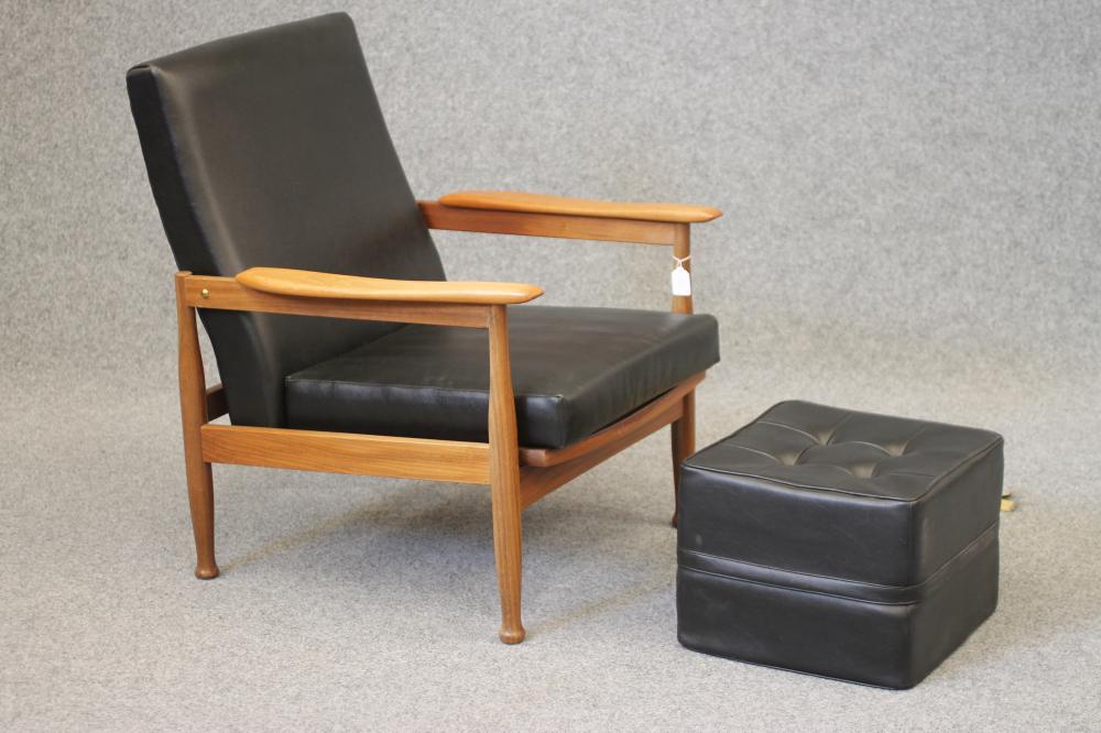 A 1960'S TEAK FRAMED ARMCHAIR with adjustable back and seat Image