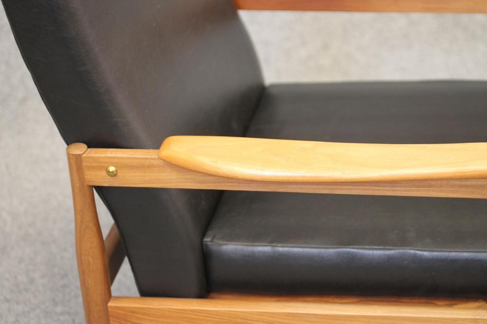 A 1960'S TEAK FRAMED ARMCHAIR with adjustable back and seat Image