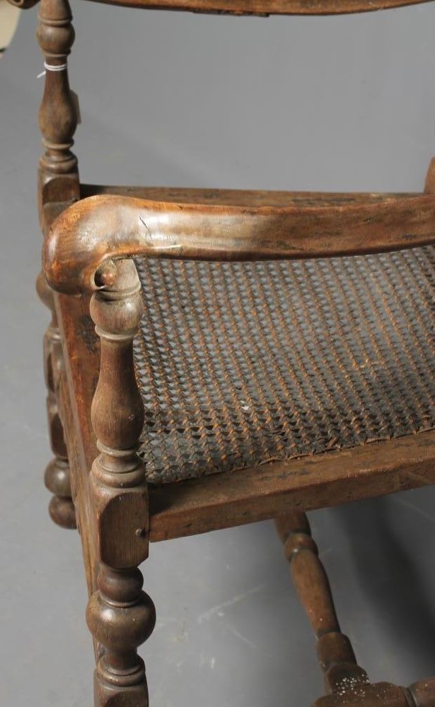A CAROLEAN CANED BEECH ELBOW CHAIR Image