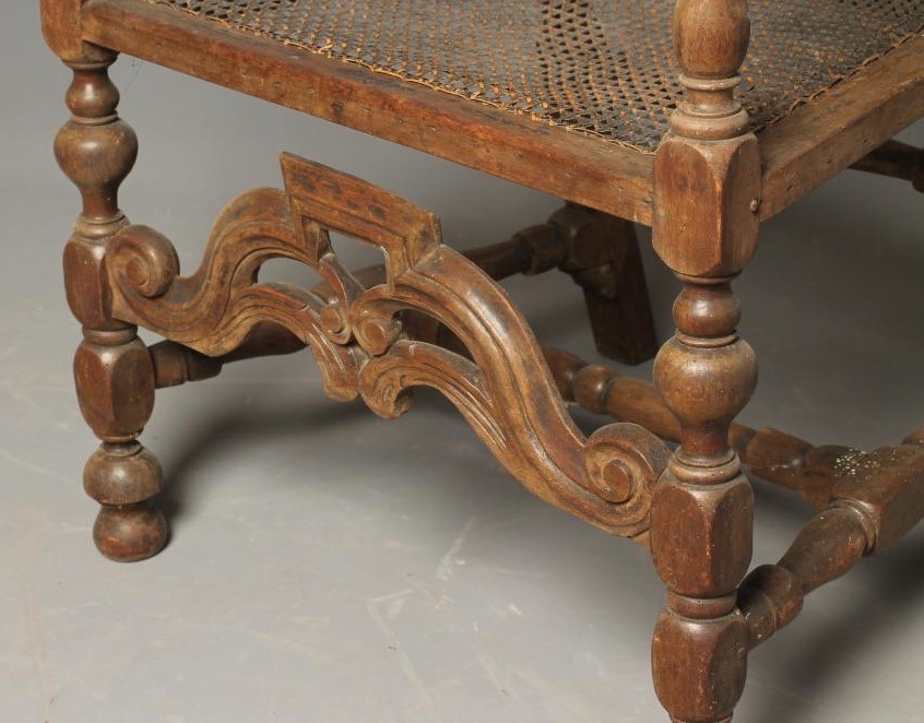 A CAROLEAN CANED BEECH ELBOW CHAIR Image