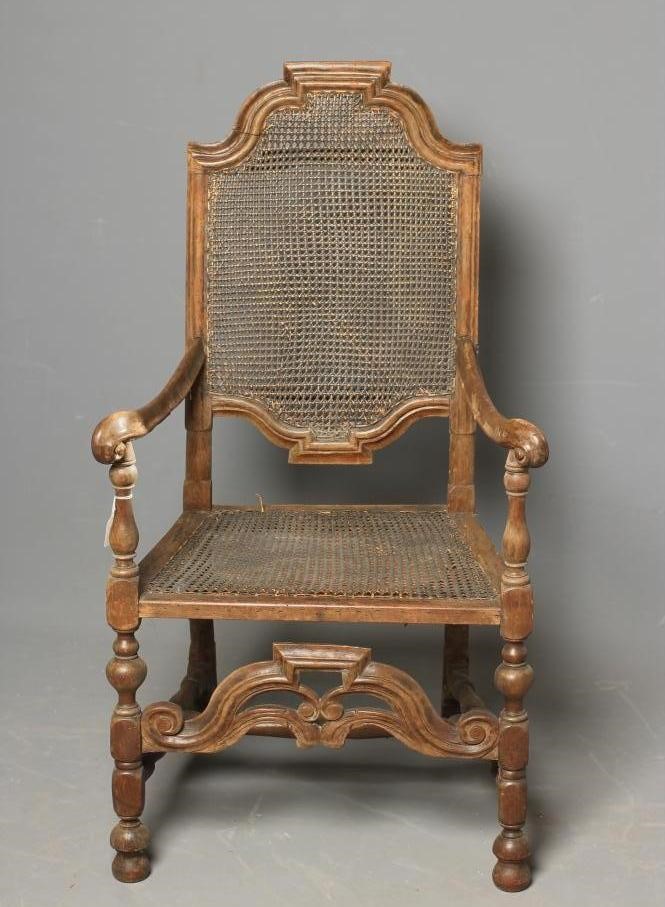 A CAROLEAN CANED BEECH ELBOW CHAIR Image