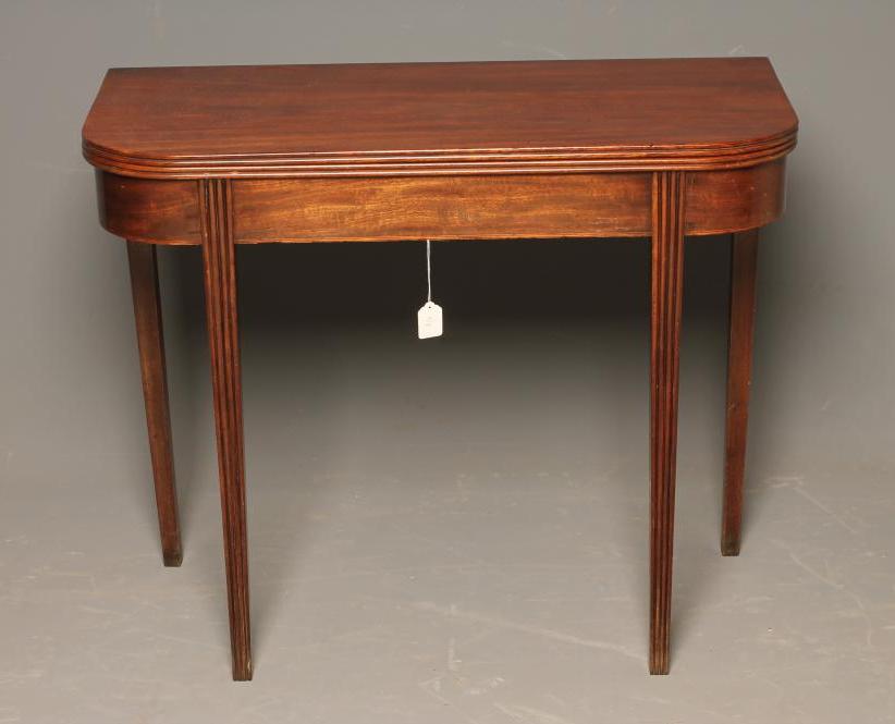 A GEORGIAN MAHOGANY FOLDING TEA TABLE Image