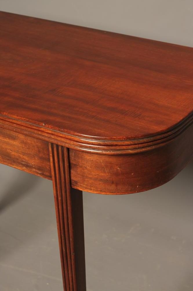A GEORGIAN MAHOGANY FOLDING TEA TABLE Image