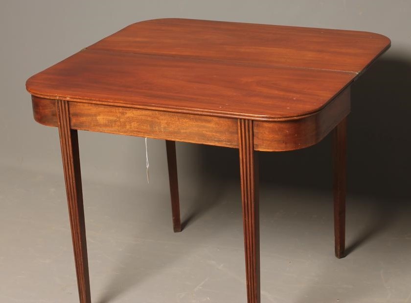 A GEORGIAN MAHOGANY FOLDING TEA TABLE Image