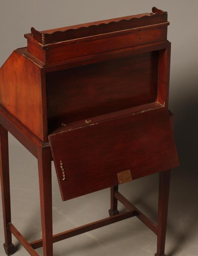 AN EDWARDIAN MAHOGANY BONHEUR DU JOUR with chequer stringing and inlaid paterae Image