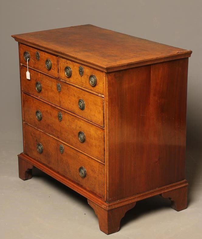 AN EARLY GEORGIAN WALNUT CHEST Image