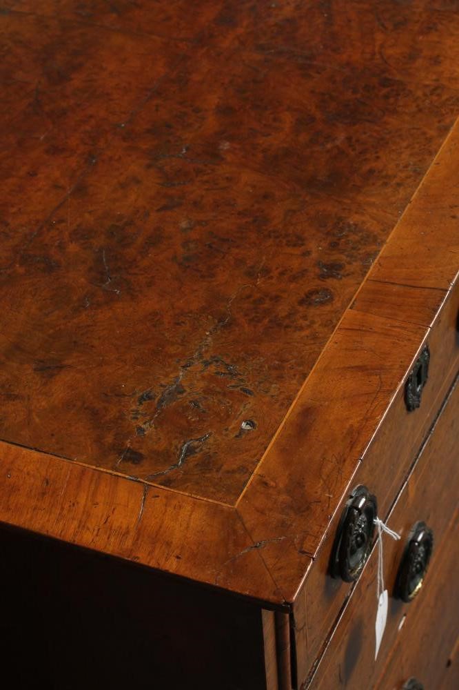 AN EARLY GEORGIAN WALNUT CHEST Image