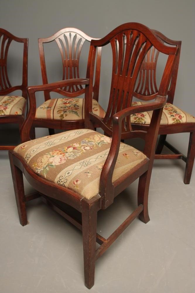 A SET OF EIGHT GEORGIAN MAHOGANY DINING CHAIRS including two elbow chairs Image