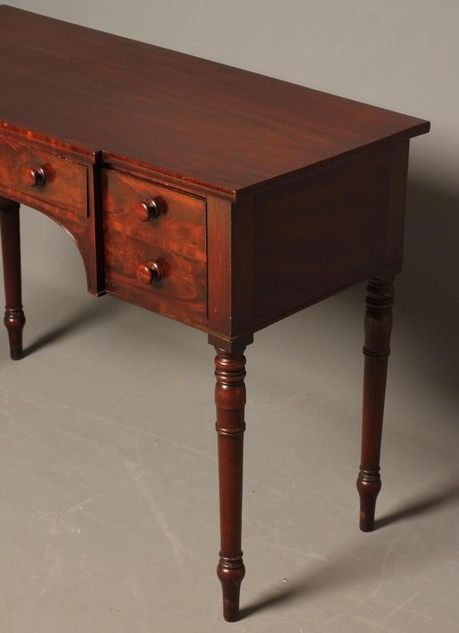 A REGENCY MAHOGANY DRESSING TABLE of breakfront form Image