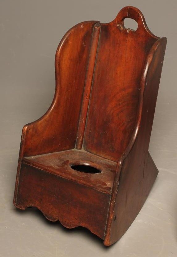 A CHILD'S GEORGIAN MAHOGANY ROCKING CHAIR Image