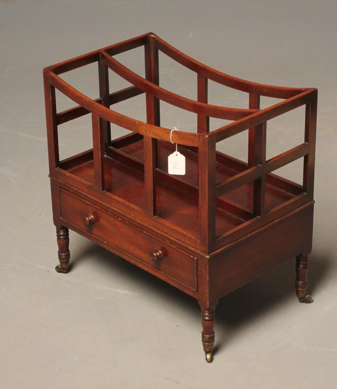 A REGENCY MAHOGANY CANTERBURY of oblong dished form with three slatted divisions Image