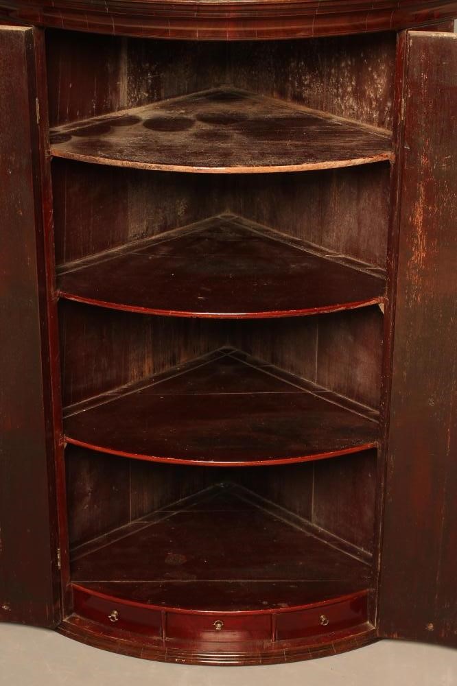 A GEORGIAN MAHOGANY QUADRANT CORNER CUPBOARD Image