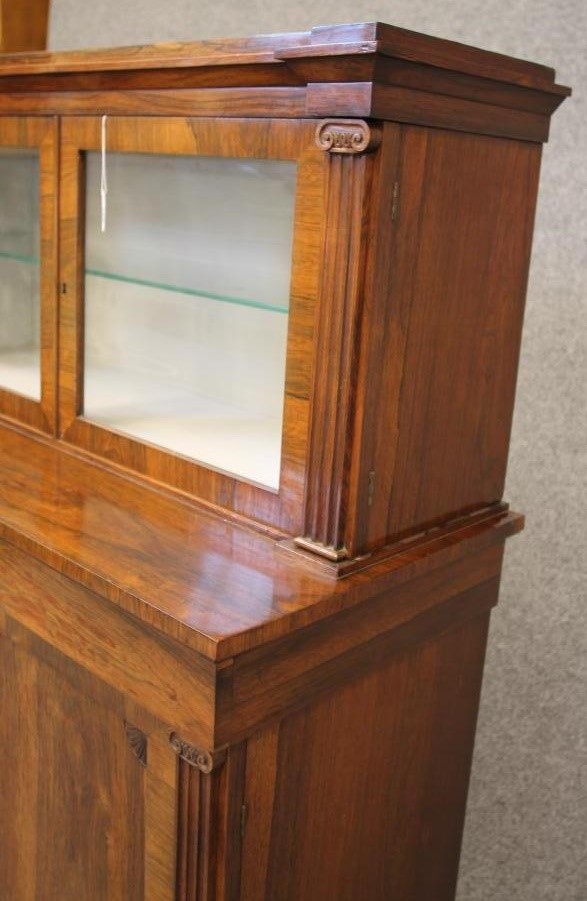 AN EARLY VICTORIAN ROSEWOOD TWO STAGE CABINET Image