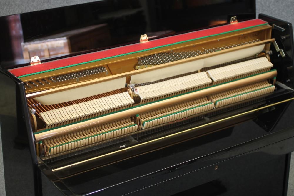 AN UPRIGHT PIANO by Waldstein Image