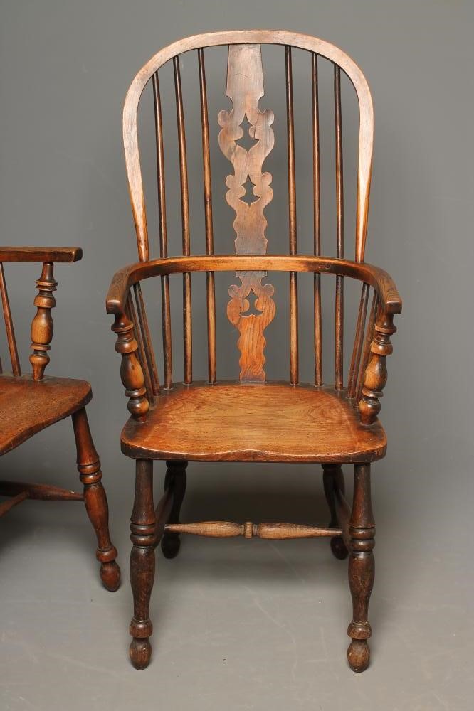 A MATCHED PAIR OF ASH AND ELM WINDSOR ARMCHAIRS Image