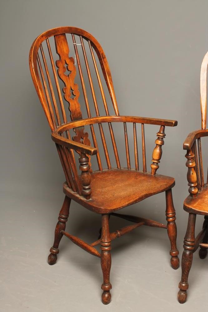 A MATCHED PAIR OF ASH AND ELM WINDSOR ARMCHAIRS Image